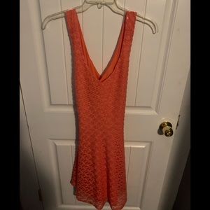 Coral color shirt dress with criss cross back worn once excellent condition